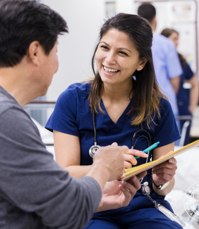 Adult Carer with Talking to A Patient, The Prime College